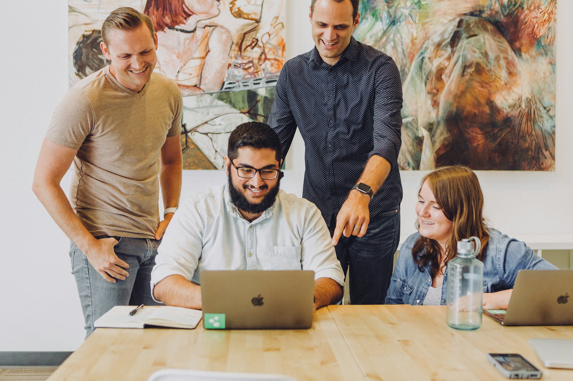 Arghafy team reviewing a project together